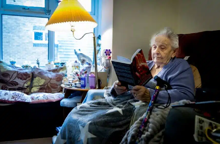 Elderly woman reading